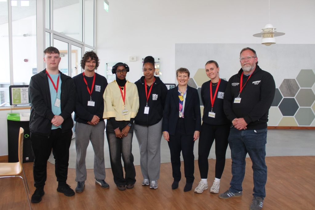 PCC Clare Moody stands beside film maker Neil Maggs and young people from Empire Fighting Chance