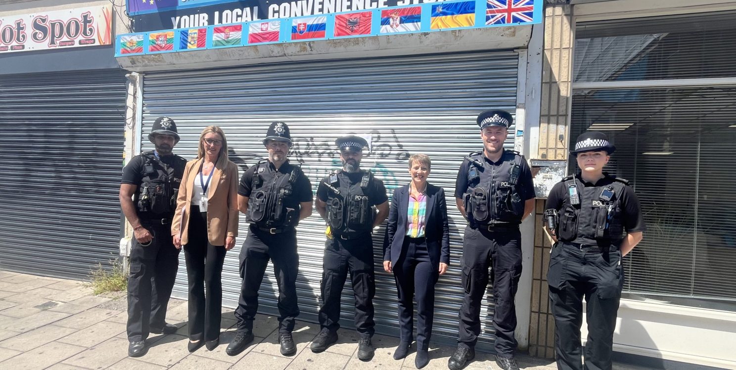 PCC Clare Moody and officers from the Barton Hill Neighbourhood Policing Team stand outside the closed Danube Mini Market.